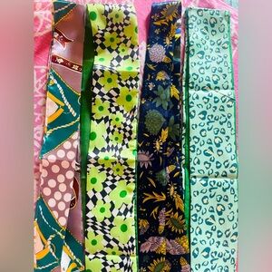 Four beautiful silk twillys in green patterns. Brand new!